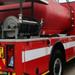 camion pommpieri rosso con targa gialla